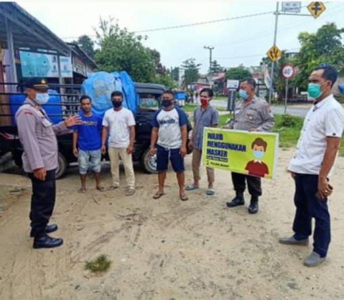Kapolsek Bunut Pimpin Langsung Sosialisasi dan Himbauan Protokol Kesehatan Covid-19
