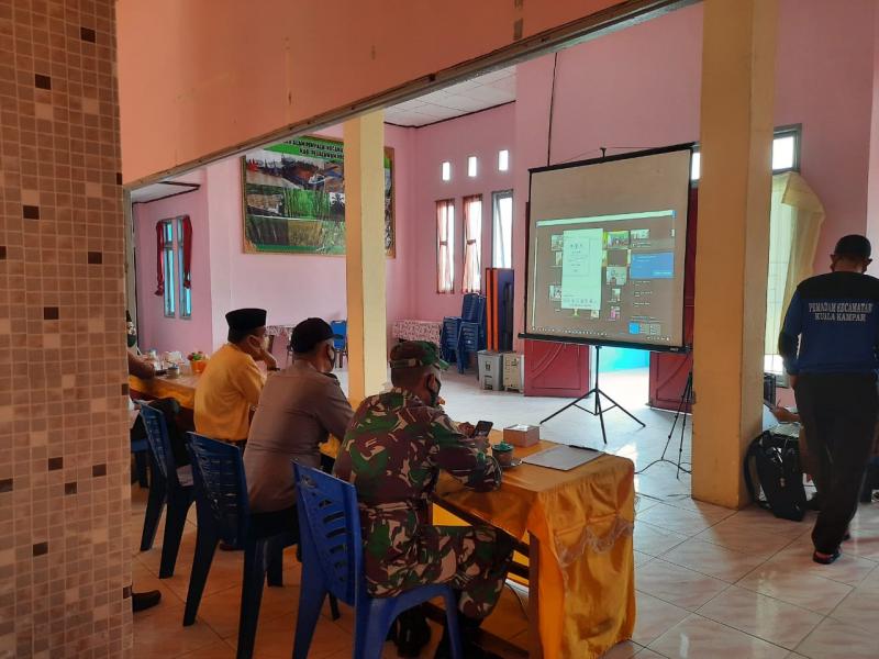 Kapolsek Kuala Kampar Hadiri Giat Pembukaan MTQ Pelalawan Secara Virtual