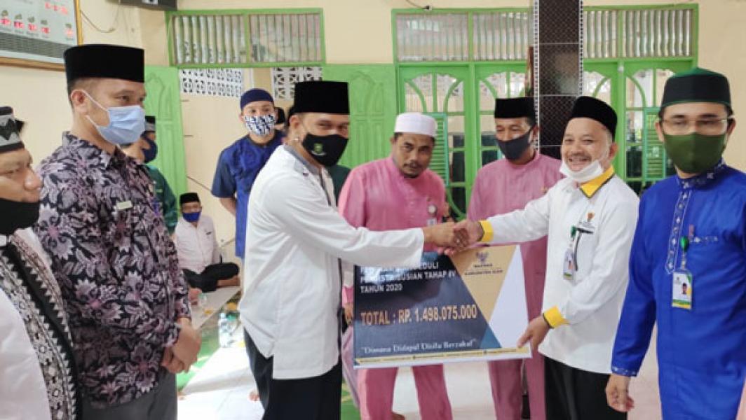 Pjs Bupati Siak Hadiri Penyaluran Zakat Konsumtif di Kecamatan Lubuk Dalam