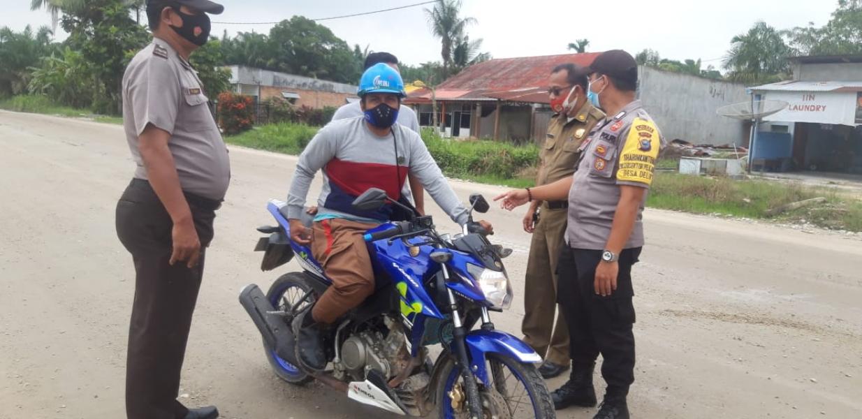 Polsubsektor Pelalawan Lakukan Himbauan Prokes ke Desa Lalang Kabung