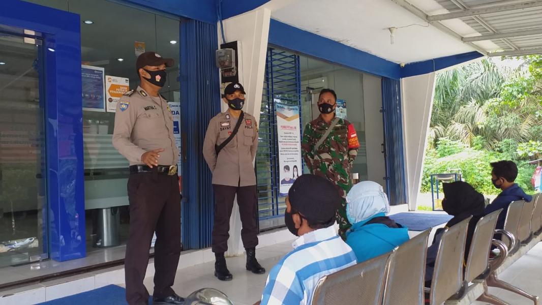 Terapkan Protokol Kesehatan, Polsek Kerumutan Libatkan Bhabinkamtibmas dan Babinsa