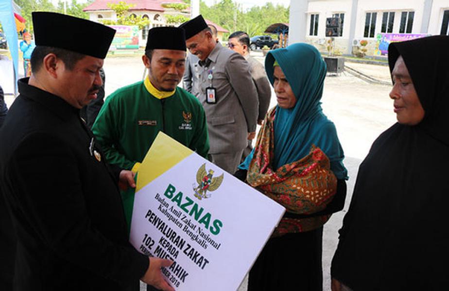 Bupati Amril Serahkan Tiga Program Strategis Baznas