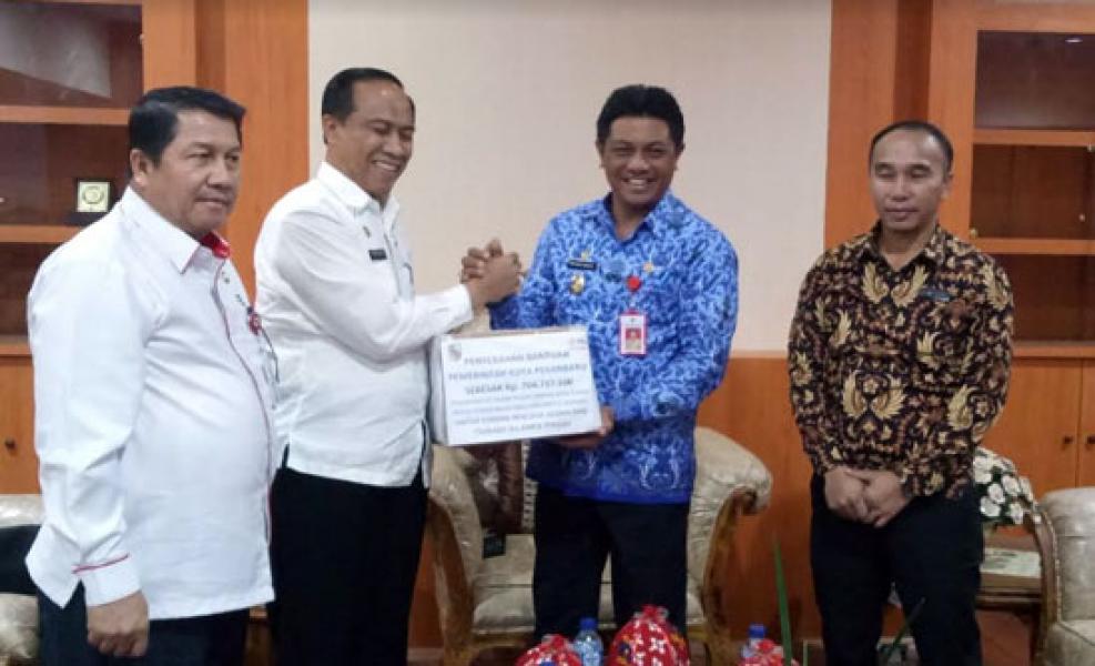 Setko Pekanbaru Serahkan Bantuan Gempa dan Tsunami Sulteng