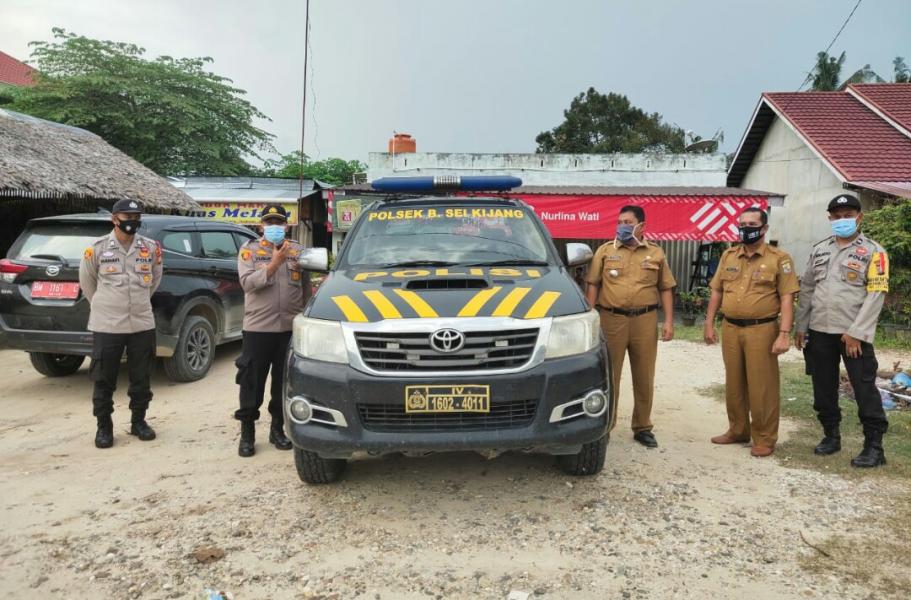 Personil Polsek Bandar Sei Kijang, Fokus Sosialisasi Pencegahan Covid-19 Bersama Camat