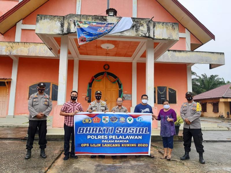 Polsek Ukui Laksanakan Baksos Dalam Rangka Ops Lilin Lancang Kuning 2020