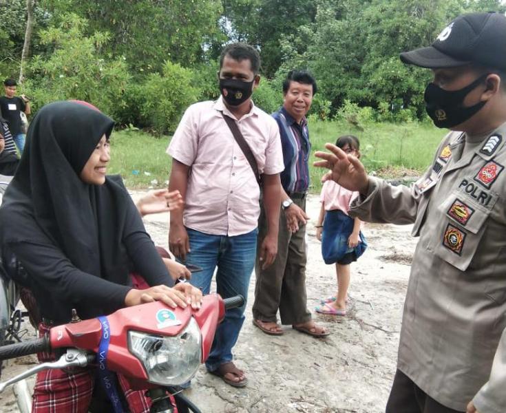 Tingkatkan Kedisiplinan Masyarakat Diakhir Tahun, Polsek Teluk Meranti Himbau Warga Patuhi Prokes 